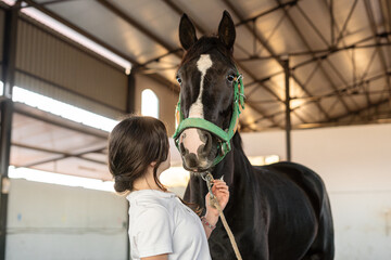 funny moment between a girl and  horse  in equestrian therapy 