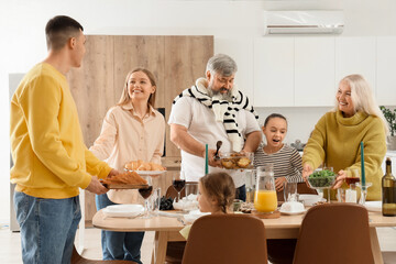 Big family setting dining table in kitchen