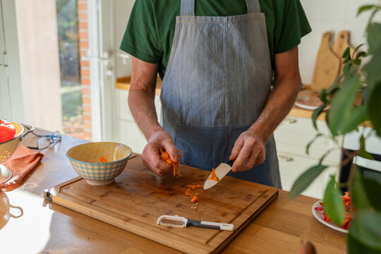 Man slice vegetables