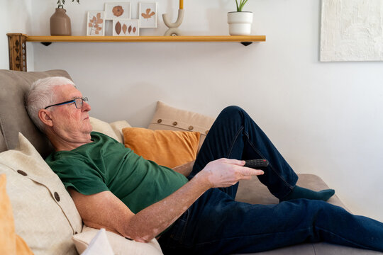 Senior man relax at sofa