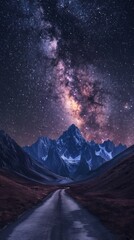 A road leading to distance in a mountain valley with a milky way