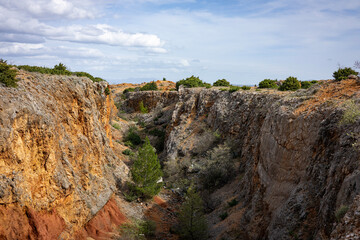cliff in the mountains old mine