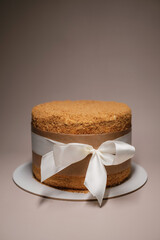 honey cake tied with white ribbon