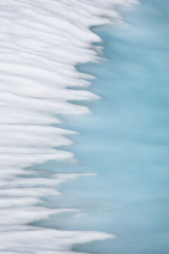 Abstract Blue Process Of Snow Melt