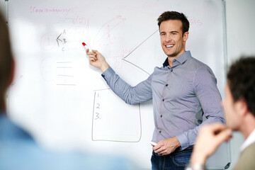 Happy man, presentation and coaching team with whiteboard for meeting, staff training or planning at office. Male person, speaker or employee showing colleagues graph, chart or information on board