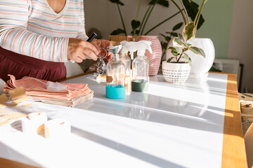 Woman preparing cleaning material