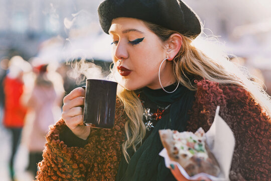 Stylish Blond Enjoying Bread and Wine