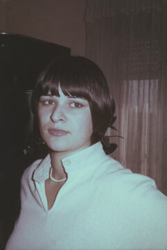 1979. Woman posing for a photo 