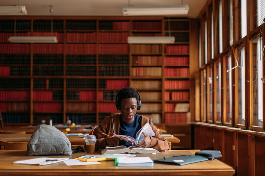 Student reading in library