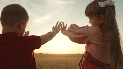 little child kid boy girl stretch their hand sun, ray fingers, vacation travel, religious outdoor play, fostering happiness kids, family outdoor activities, children reaching sun, family happiness