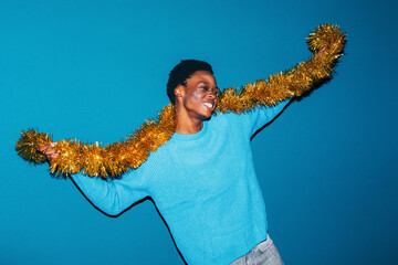 Man with tinsel
