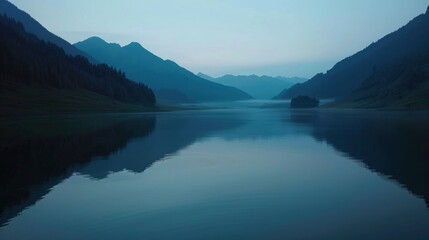 The tranquil beauty of a mountain lake at dawn, its surface mirror-like and undisturbed. Surrounding mountains are reflected perfectly in the water, with the first light of day casting a soft glow