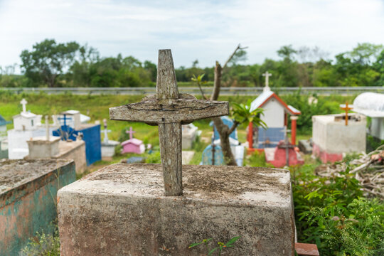 Christian Cross On A Grave In A Rural Cemetery In Mexico.