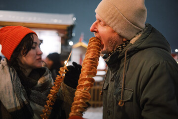Couple Tasting German Market Delights