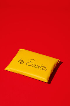 letter to santa in a yellow envelope