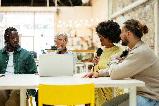 Diverse friends talking on a live podcast