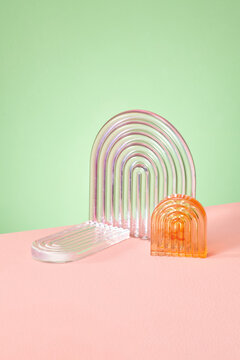 Scene with transparent geometrical forms on a pastel
