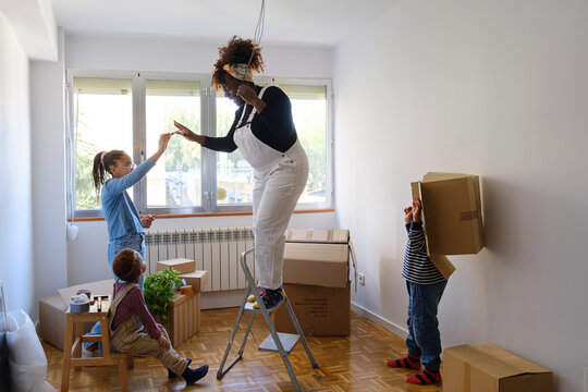 Happy Family moving in their new home