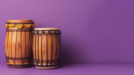 Two wooden djembe drums against purple background with ample space for text on right side