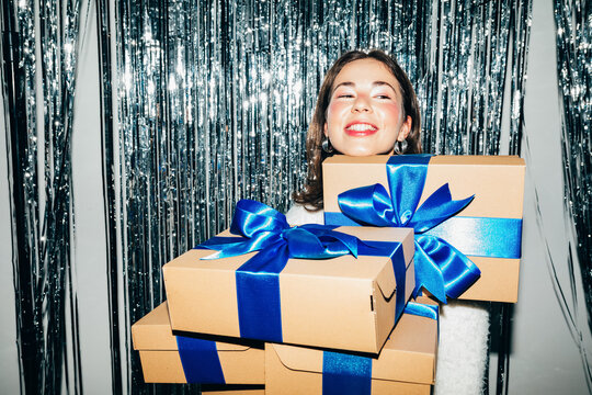 Woman posing with presents