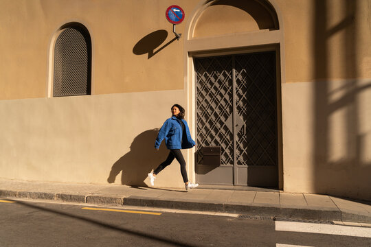 Running woman portrait street