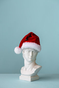 Male plaster bust with santa hat