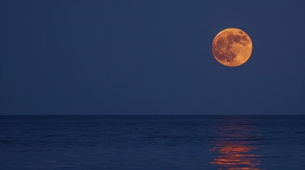Midnight Blaze: Moon's Touch Sets the Sea Aglow
