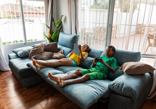 two brothers on the sofa at home