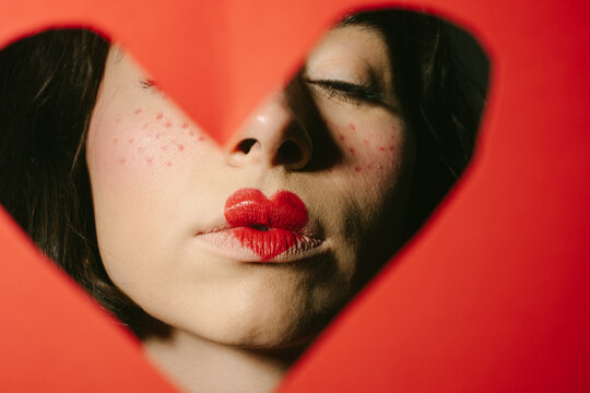 Valentine's Day Close-up Portrait Of Woman with Heart-Shaped Lips