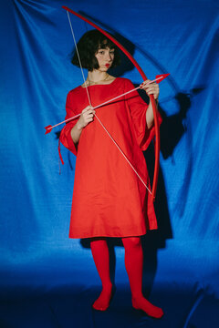 Valentine's Day Girl in Red with Bow and Arrow