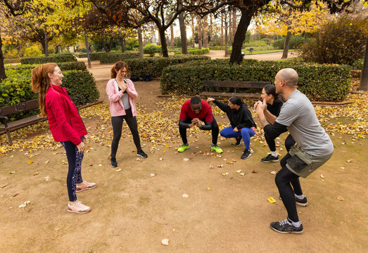 GROUP OF FRIENDS DOING SPORTS