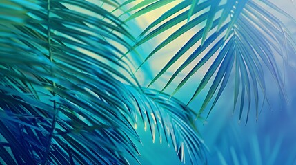 Bright green palm leaf against a gradient blue background, giving off a tranquil and tropical vibe with a focus on the natural element