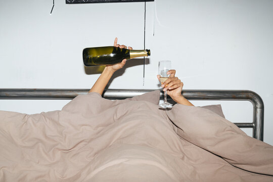 Champagne Pour in Bed