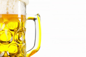 A glass mug filled with a golden yellow beer, topped with a white foam.