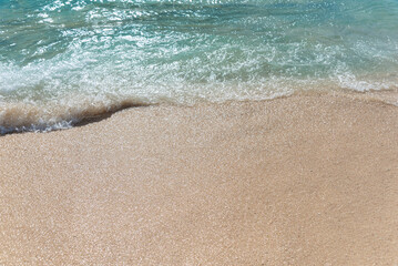 Sand beach and ocean wave