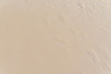 Beautiful sand beach and footprints
