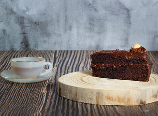 Heavenly taste: Handmade chocolate and hazelnut tart accompanied by a cup of tea