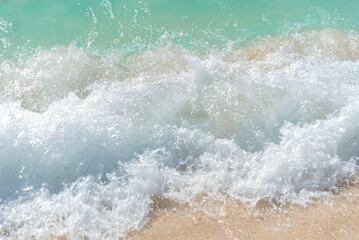 Sand beach and ocean wave - obrazy, fototapety, plakaty