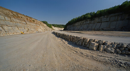 Asphalt road in a quarry, close-up view of the road