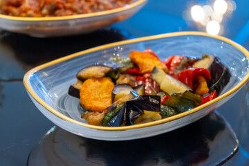 Meze or mezze starter food, selection of small dishes served as appetizers in Albanian, Bosnian, Armenian, Levantine, Turkish, Bulgarian, Greek, Egyptian, Balkan, Caucasian, Persian cuisine