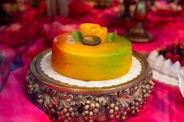 Italian sweet dessert pastry dolce and cakes with cream and fruits on display in artisanal bakery in Milan, Italy