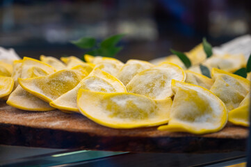 Italian food, fresh homemade stuffed pasta tortelli or ravioli dumplings ready to cook, Milan, Lombardy, Italy