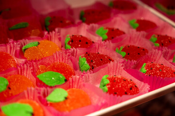 French or italian sweets, fruit jelly bonbons on display in confectionery shop in Milan, Italy...