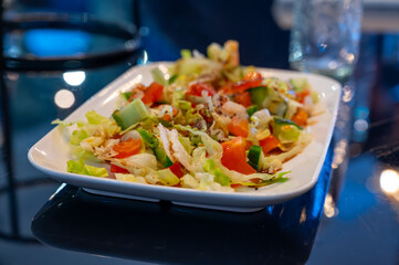 Green vegetables salad for turkish mixed grill meat, chicken wings, lamb, beef shashlik, kebab in restaurant