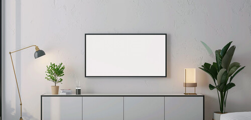 A minimalist TV cabinet with a TV mockup displaying a white screen, accompanied by a small potted plant and a sleek lamp, against a white wall background