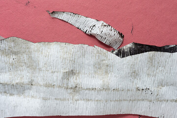ink stained crepe paper with bleed-through and discoloration on pink