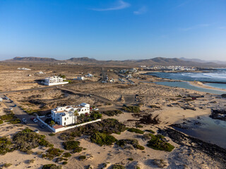 West coast of Fuerteventura island. Winter sea and sun vacation in El Cotillo touristic village, Canary islands, Spain. White sandy beach La Concha..