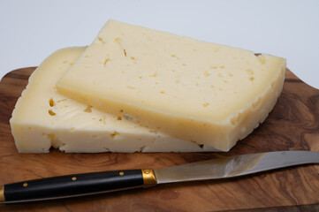 Fresh Asiago cow's milk cheese, from Asiago in Italy, used in panini or sandwiches or melted on variety of dishes, classified as a Swiss-type Alpine cheese