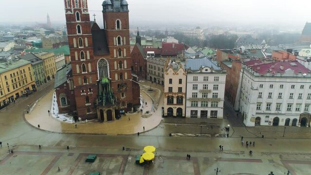Aerial View Of Cracow Main Square and Bazylika Mariacka, Beautiful Polish Footage