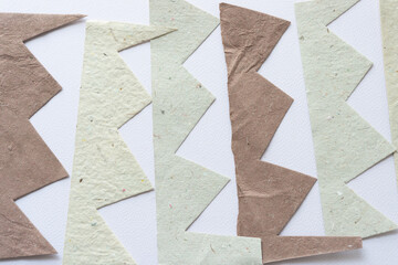 set of paper with zig zag edges on blank paper with texture